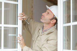 man installs a window in clarksville 
